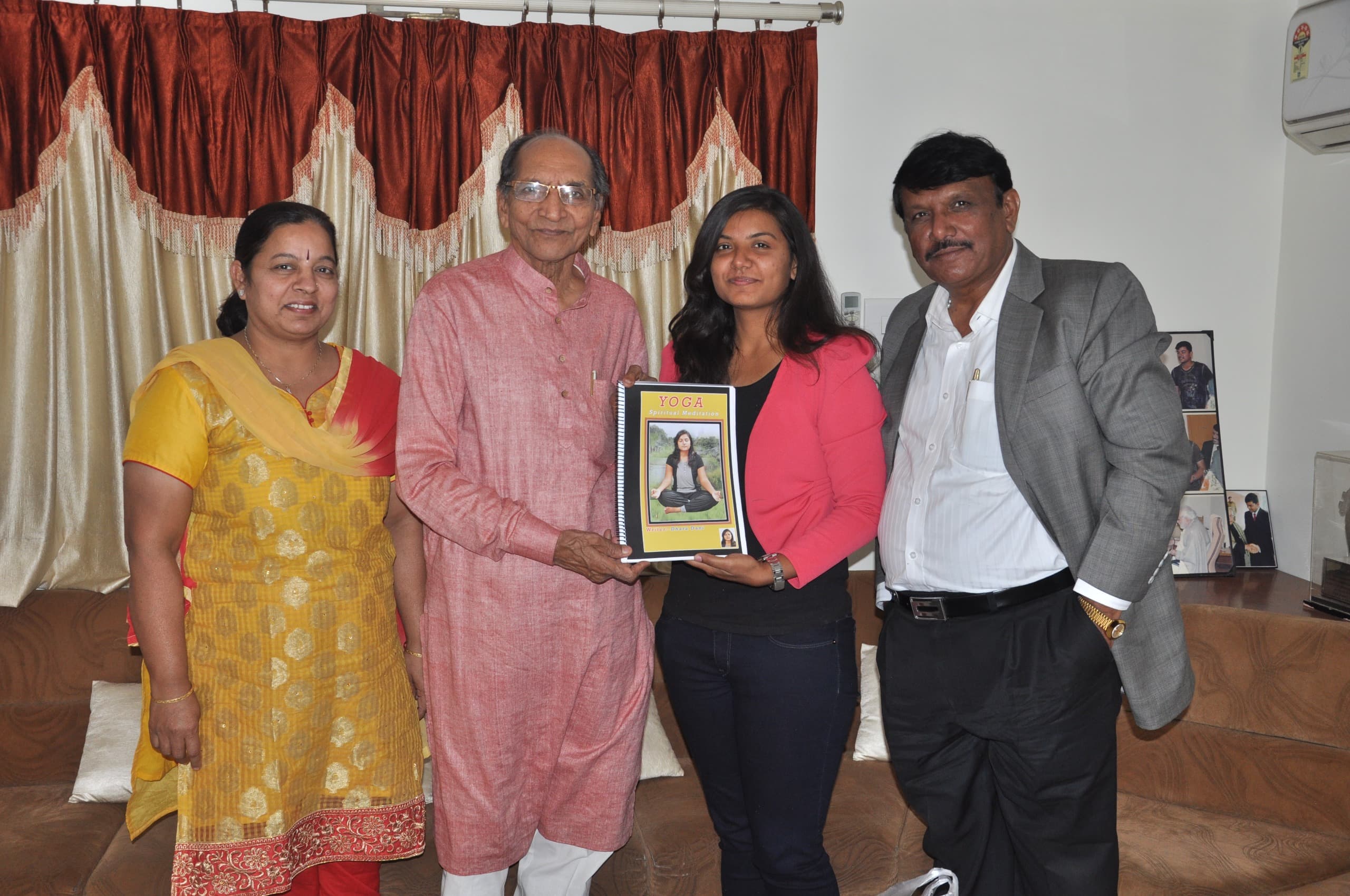 Dr. Dhara Dani presenting Spiritual Yoga book to Dr. Mafatlal Patel, Foreword Author